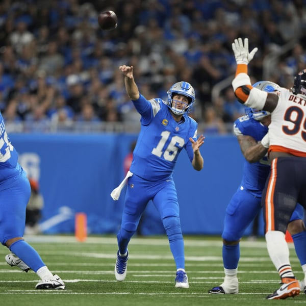 Jared Goff throwing a touchdown pass against the Chicago Bears at Ford Field in 2025 NFL Week 2 game
