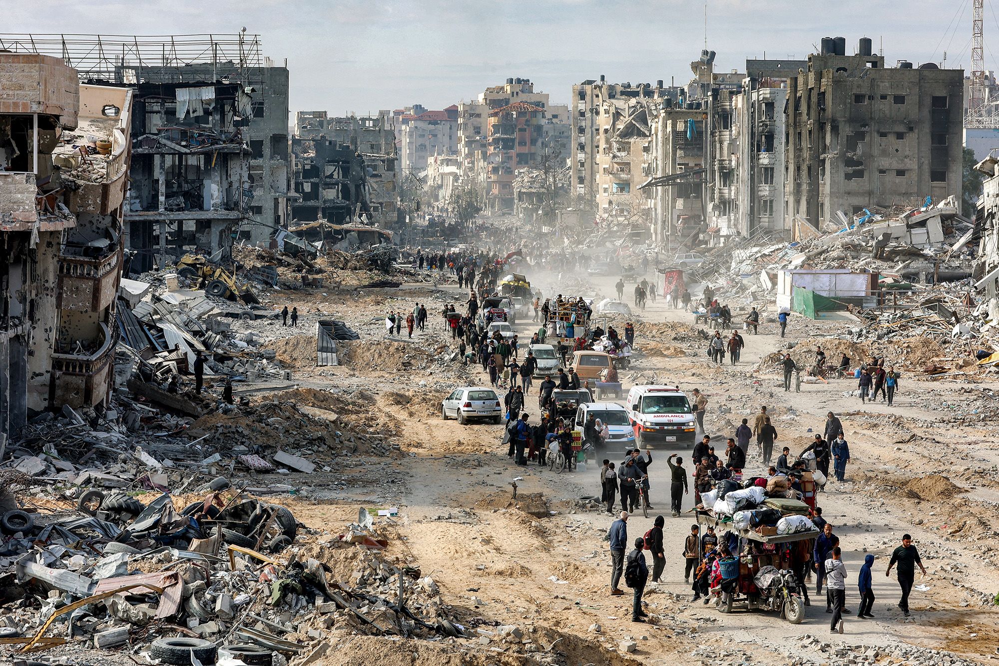 Residents walking through destroyed streets in Jabalia during the ceasefire