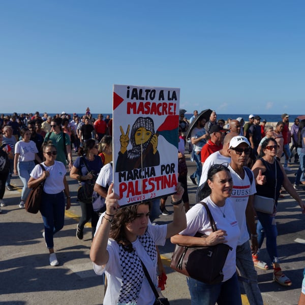 Cubans wave Palestinian flags outside the U.S. Embassy on Havana’s Malecón, Oct. 9, 2025.