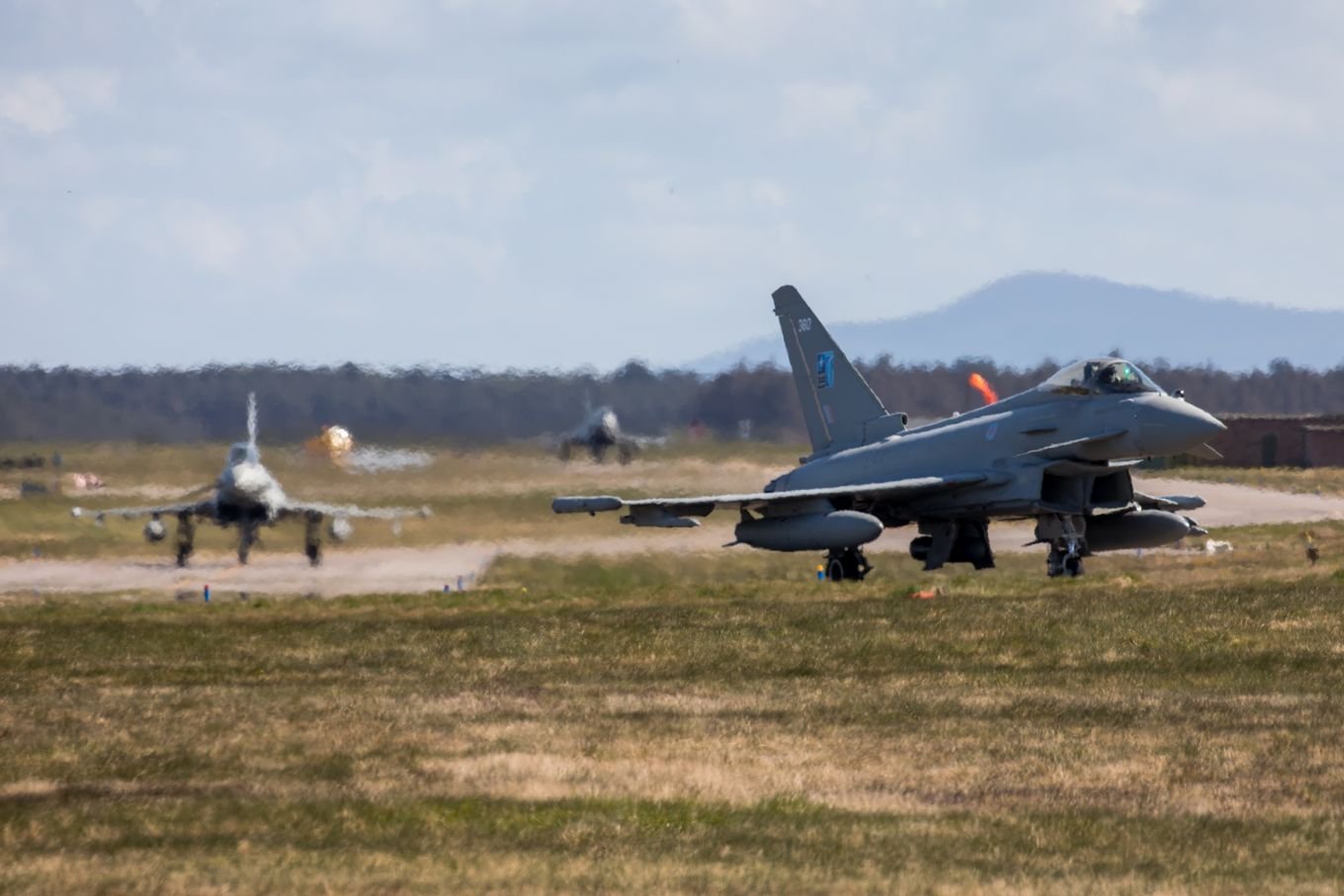 NATO fighter jets on the apron at Šiauliai Air Base during Baltic Air Policing