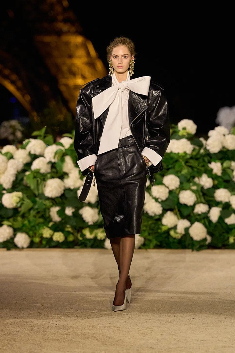 Close-up of Saint Laurent Spring 2026 black leather jacket with power shoulder and beveled lapel