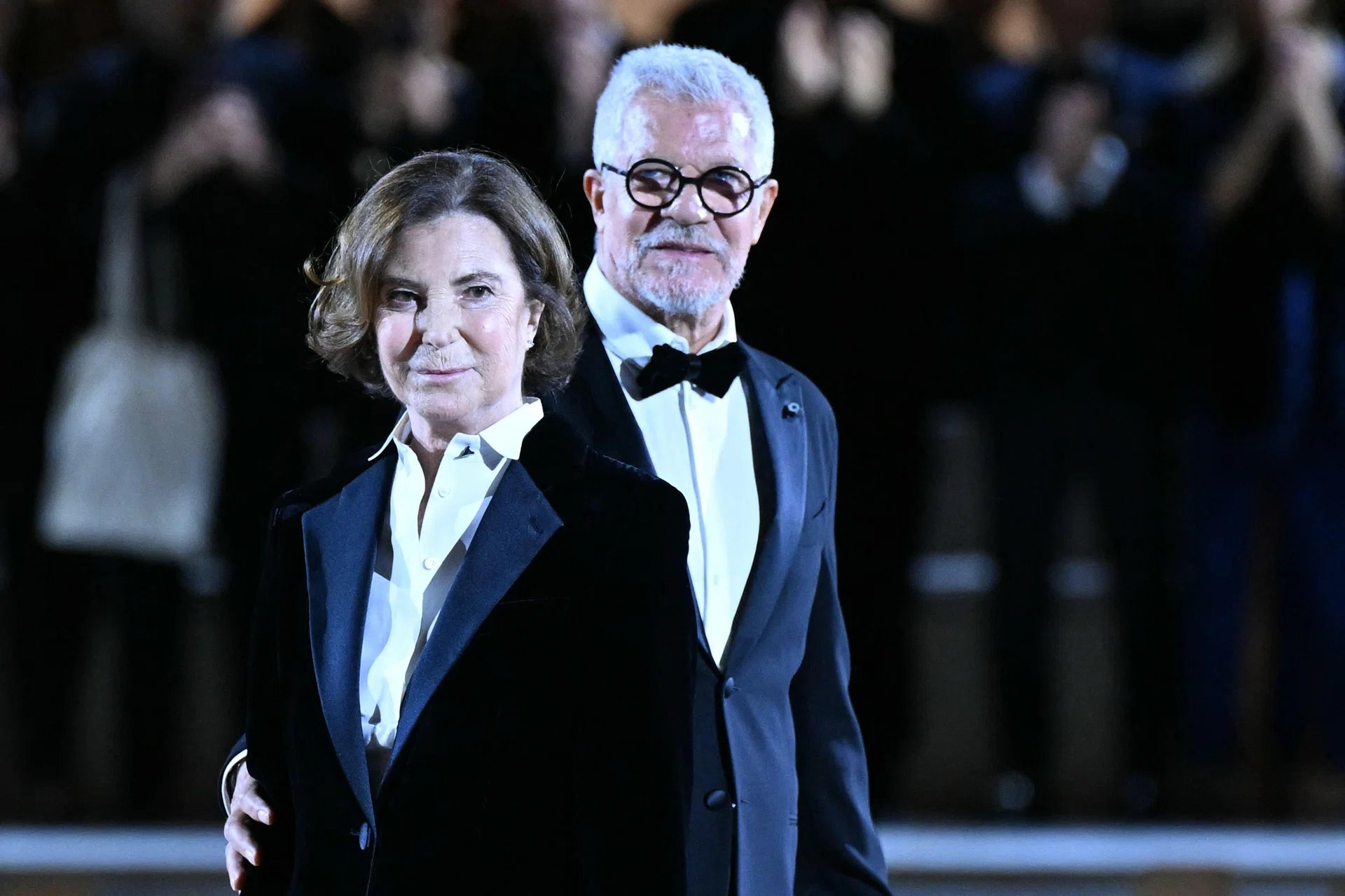 Silvana Armani and Leo Dell’Orco receive applause at Giorgio Armani’s final show