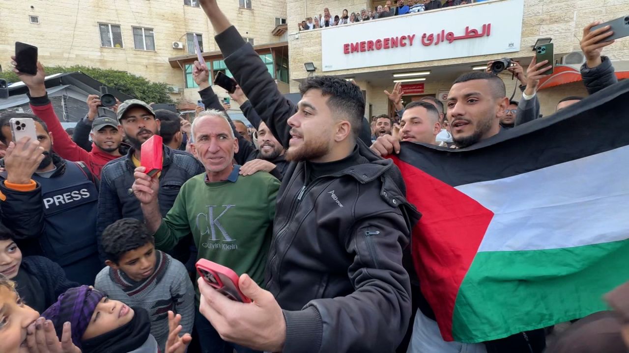 Families react with tears and flags at Hostages Square in Tel Aviv as releases proceed under the ceasefire deal