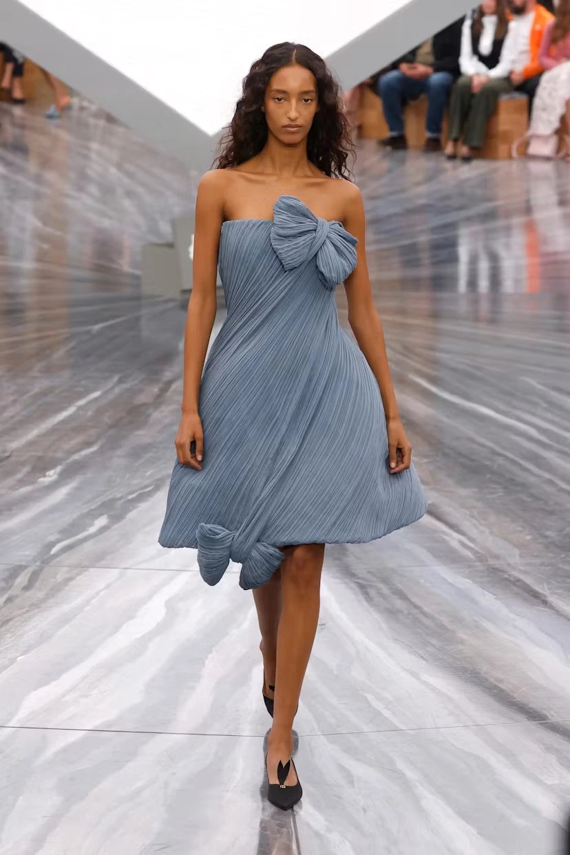 Cinematic pyramidal screen inside the Dior Spring/Summer 2026 showspace at the Tuileries