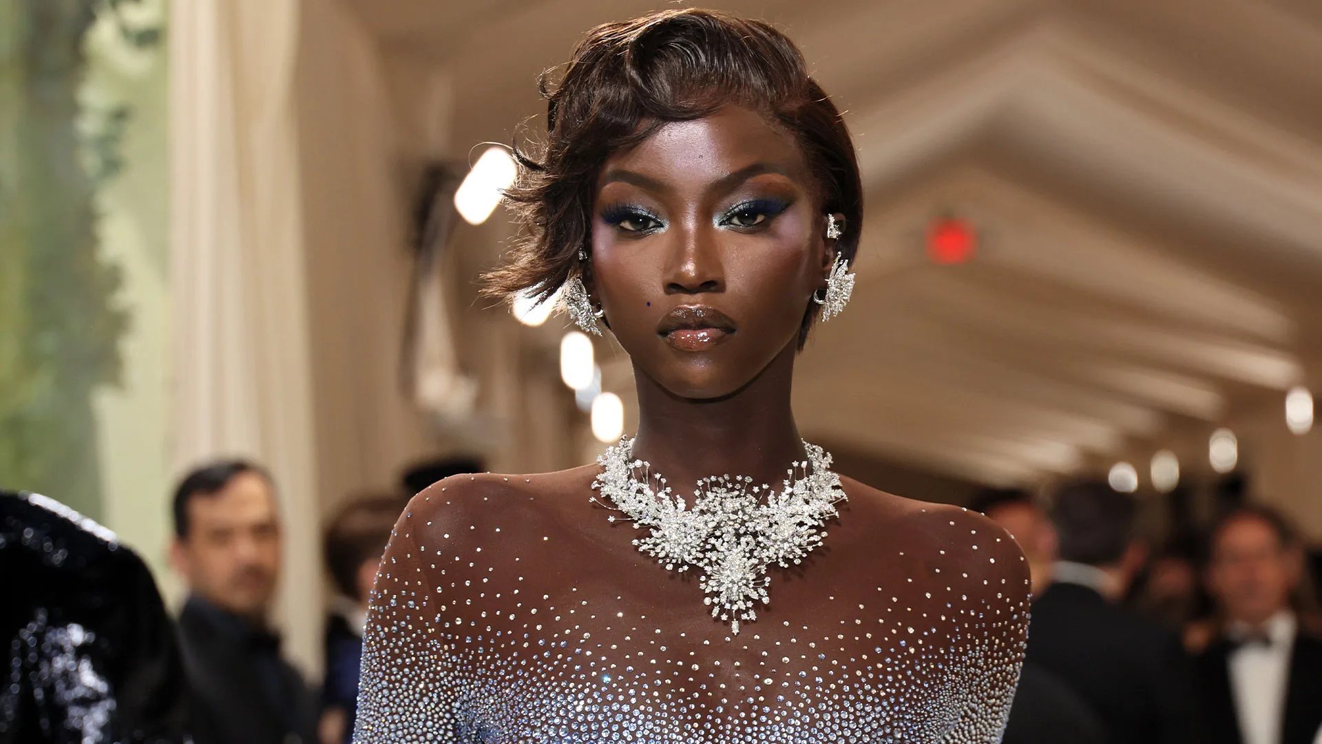 Anok Yai at British Fashion Awards 2025 wearing stylish gown on the red carpet