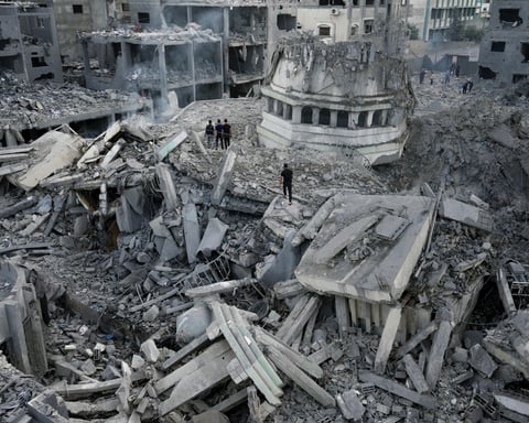 Devastated Gaza cityscape with rubble and smoke, 2025
