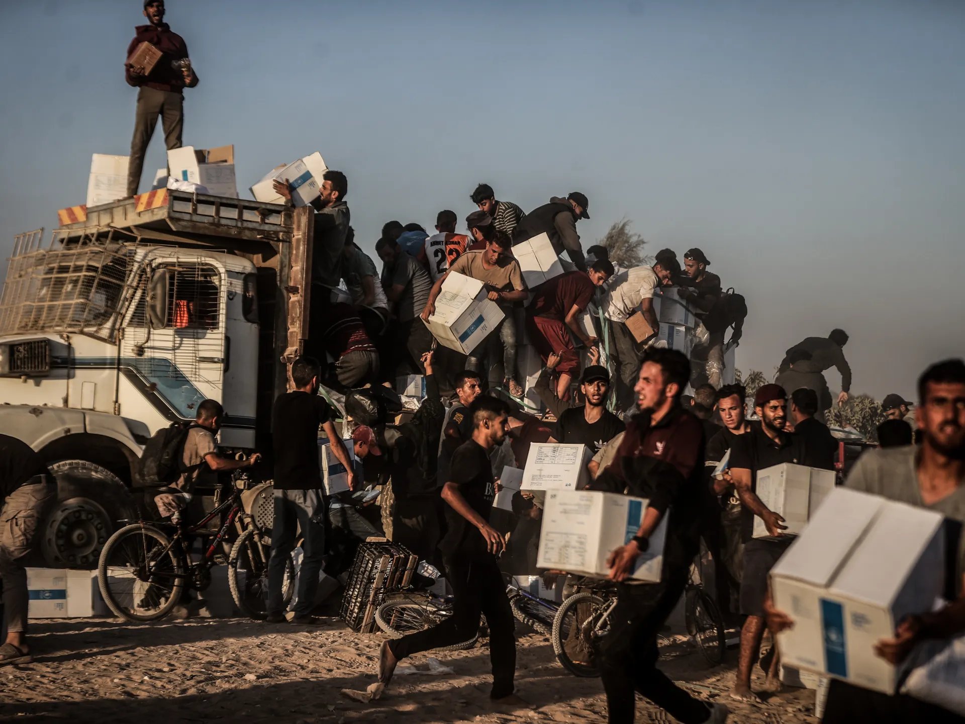 Humanitarian aid trucks attempting delivery near Gaza blockade in 2025