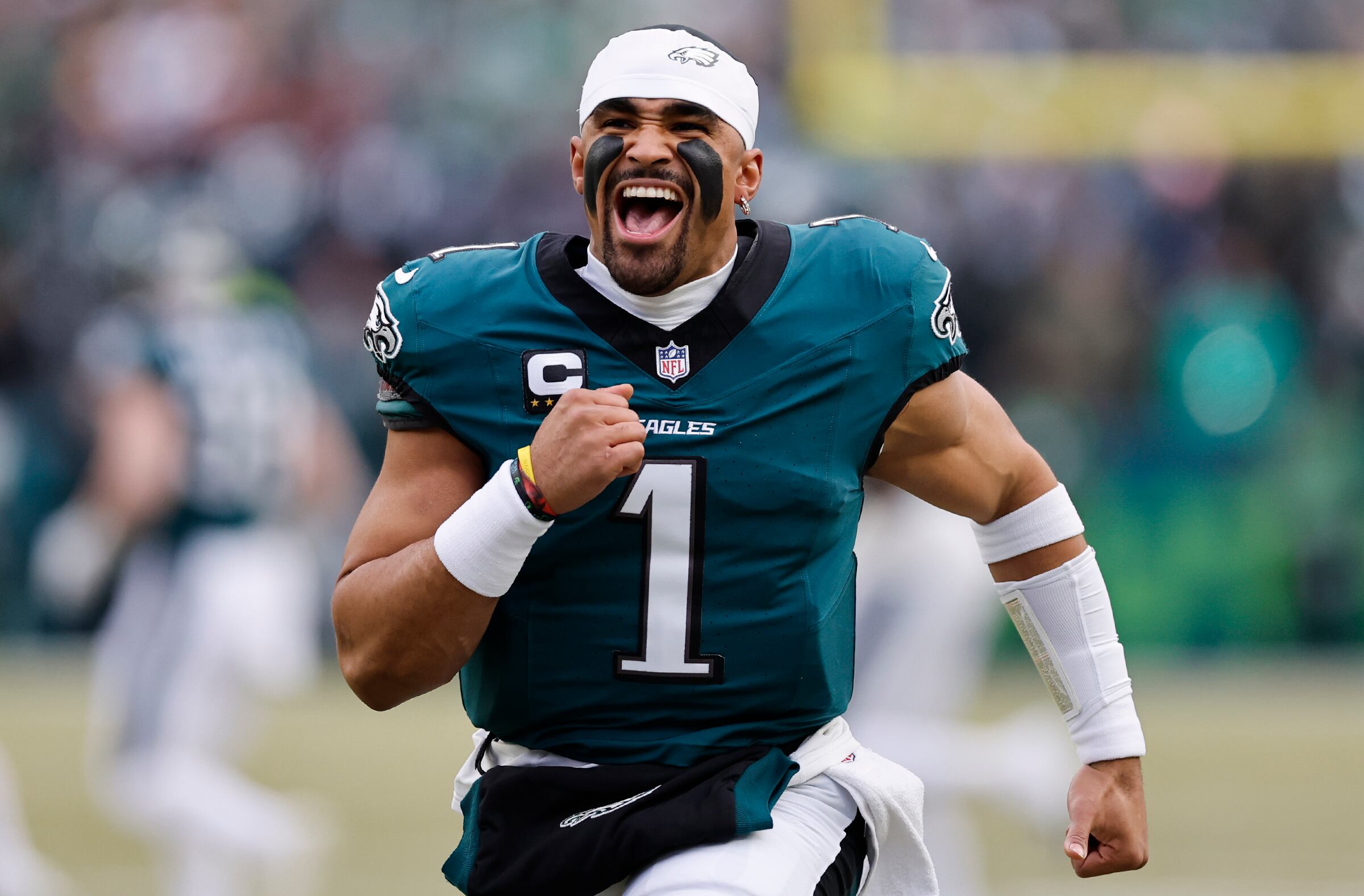 Eagles QB Jalen Hurts MVP Caliber Performance During 2025 NFL Season Jalen Hurts Philadelphia Eagles quarterback celebrating with captain's patch during elite performance showcasing MVP candidacy