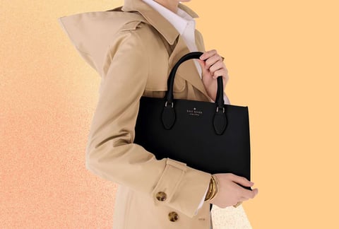 Kate Spade handbags displayed during Black Friday sale