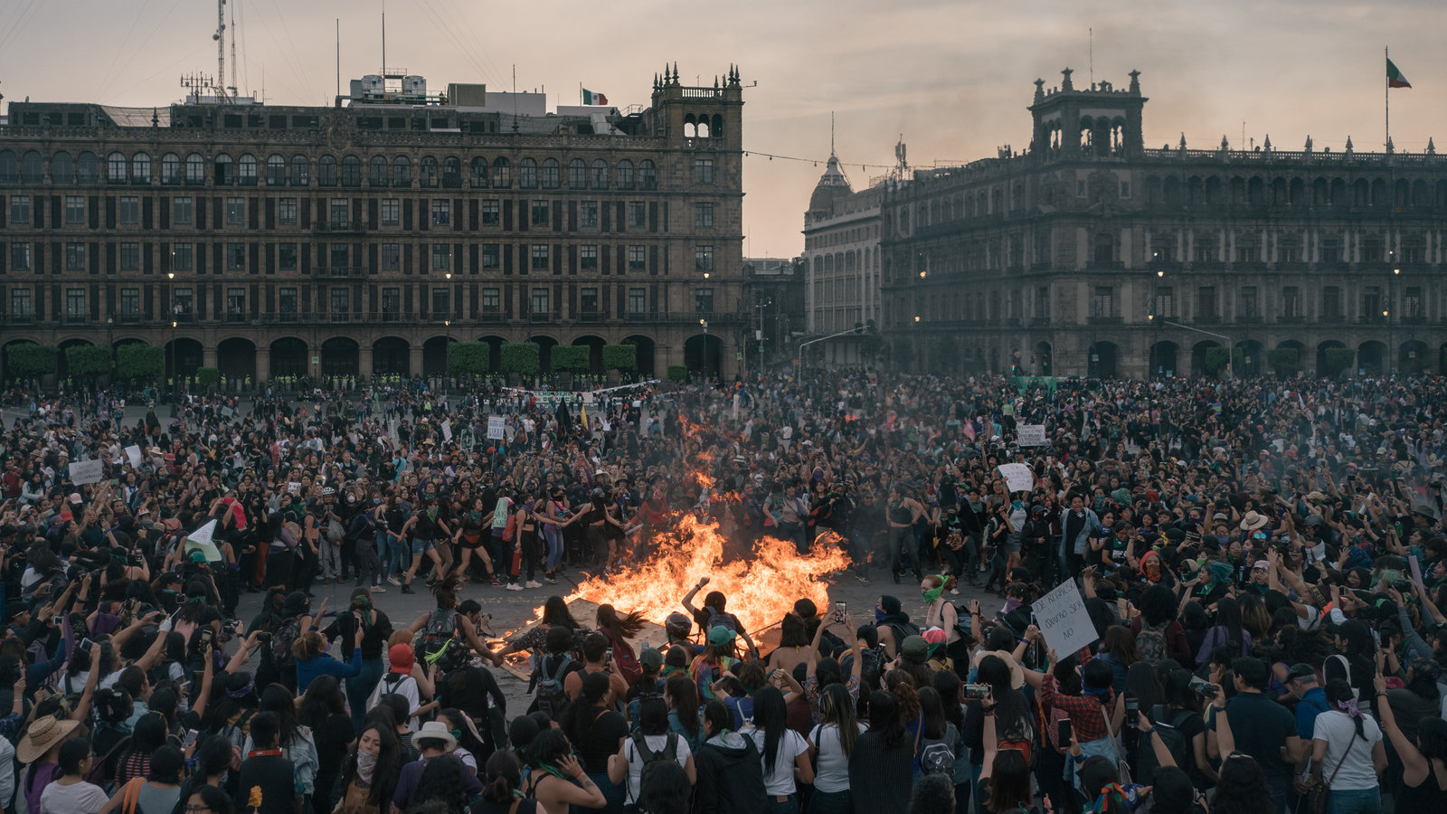 Alt: Public rally in Mexico City symbolizing women's fight against violence