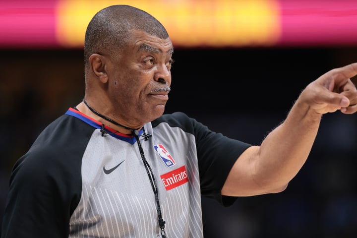 NBA referee using communication headset during 2025 season game