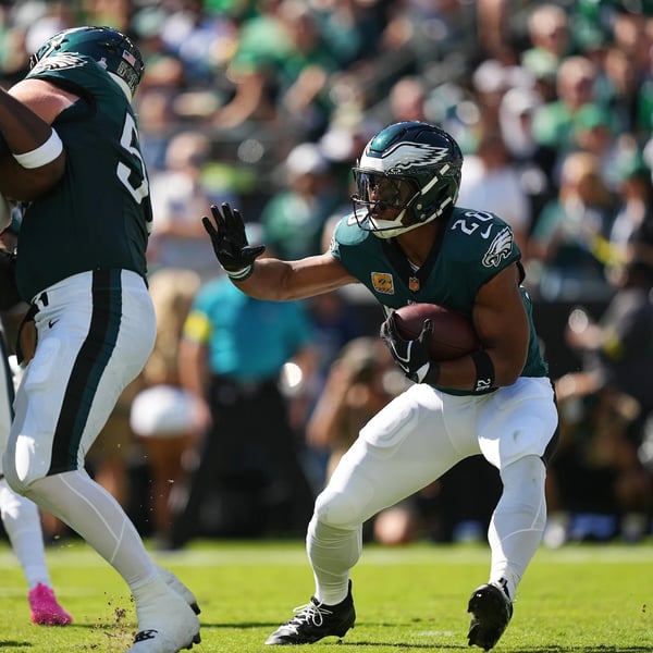 Saquon Barkley Philadelphia Eagles running back rushing with football during Week 10 NFL game against Packers