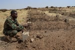Displaced Sudanese refugees flee El Fasher after RSF takeover in November 2025 humanitarian crisis