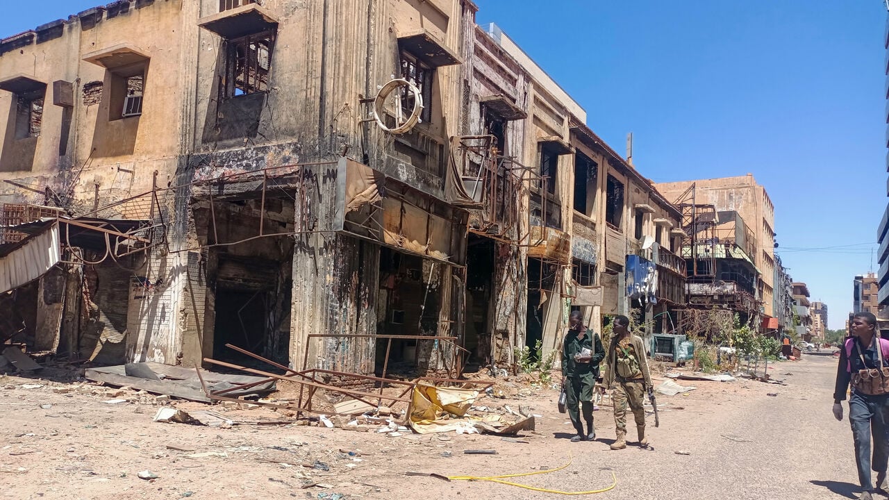 Armed Rapid Support Forces fighters patrolling streets of El-Fasher amid Sudan civil war 2025