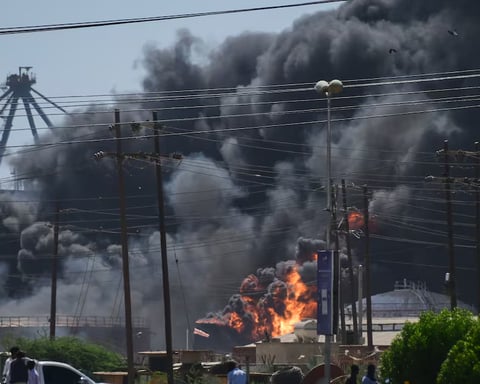 Smoke rising over a city in North Kordofan, Sudan after deadly attack on civilians