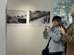 A visitor clicking photo at soviet-korean-liberation gallery