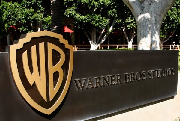 WGA SAG-AFTRA demand regulators block Netflix Warner Bros merger