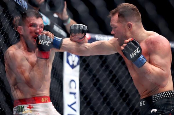 Yan Buckles Dvalishvili with Uppercuts in UFC 323 Title Fight Petr Yan lands uppercuts on Merab Dvalishvili UFC 323 round 3 striking clinic