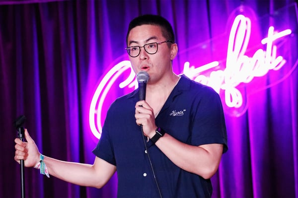Bowen Yang performing on Saturday Night Live stage