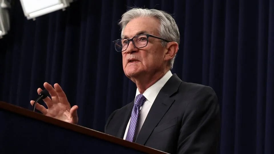 Federal Reserve Chair Jerome Powell speaking at press conference after announcing 25 basis point rate cut on December 10, 2025