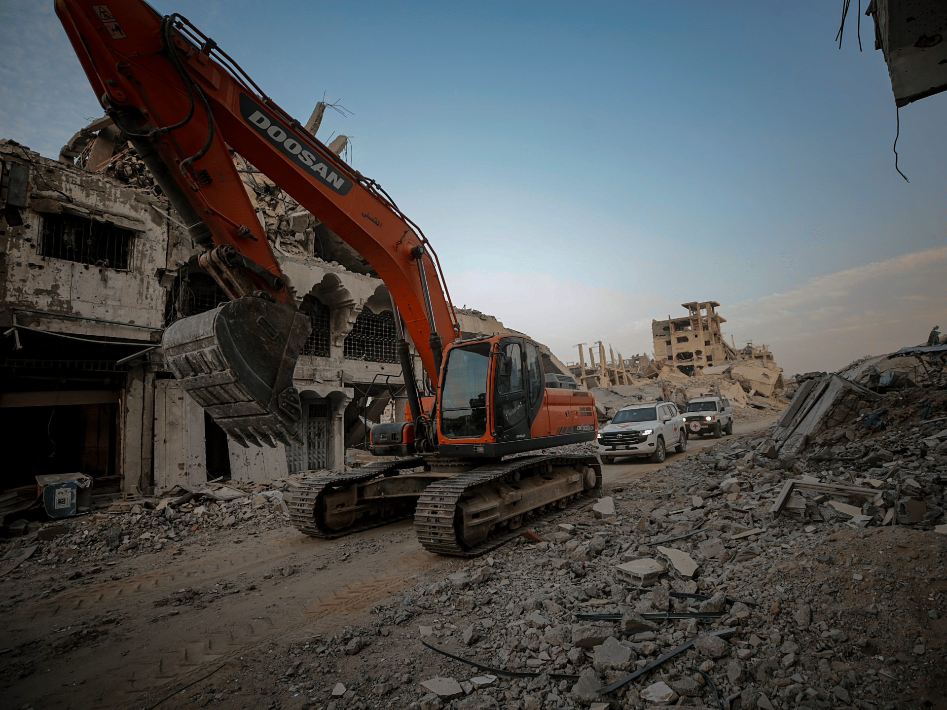 Israeli military bulldozers demolishing Palestinian homes in Gaza City during ceasefire December 2025