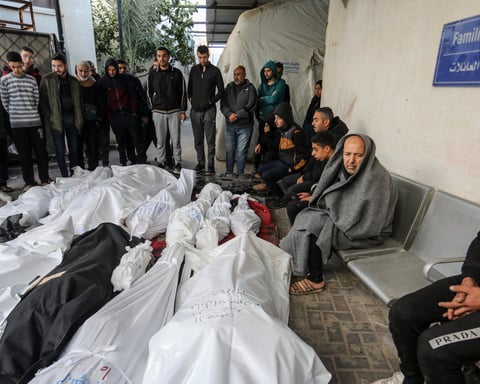 Palestinian mourners carry body of teenager killed by Israeli forces in West Bank raid December 2025