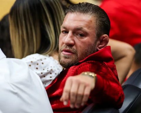 Conor McGregor sexual assault lawsuit dropped Miami Heat game