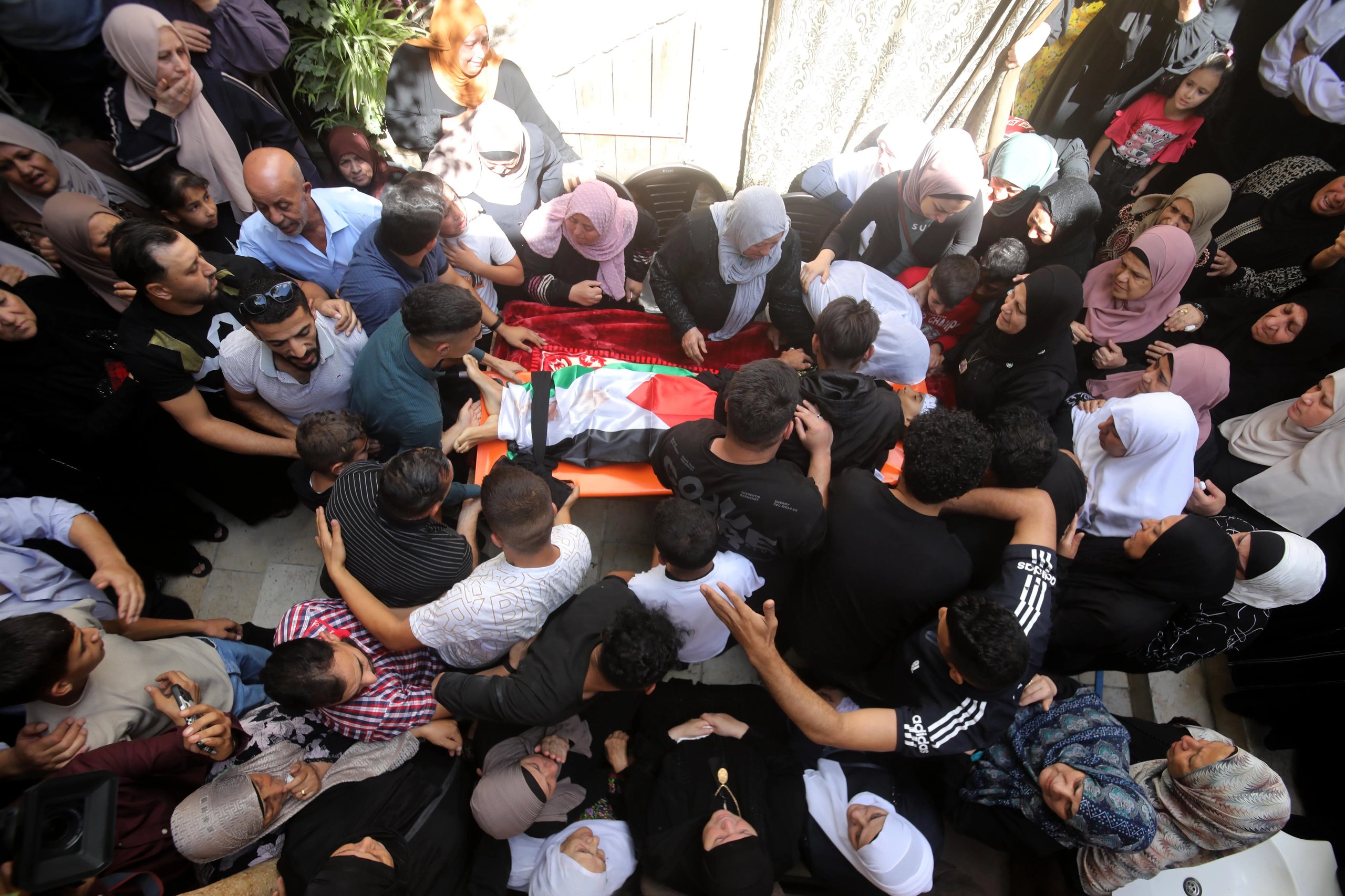 Nazi-Style Violence Shatters Jenin: Funeral of Palestinian Teenager Killed by Israeli Forces Palestinians mourn a 16-year-old boy killed by Israeli forces in Jenin