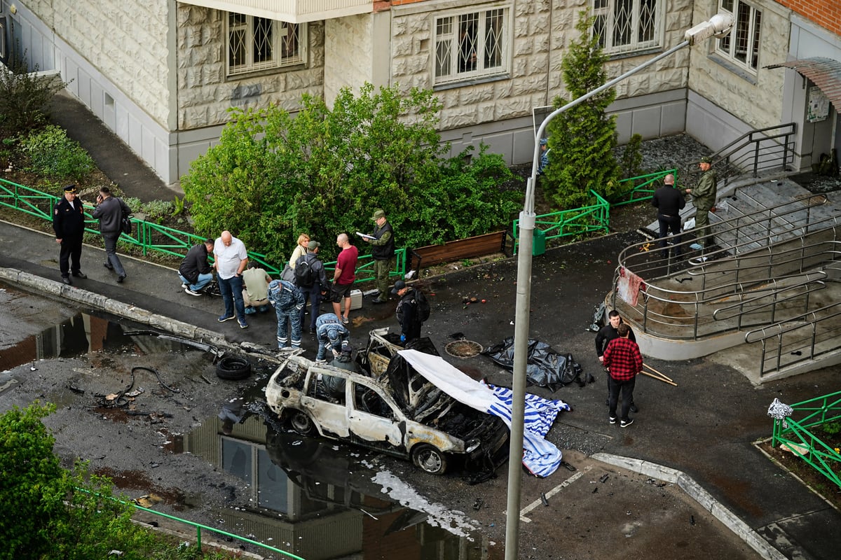 Charred SUV wreckage Lt Gen Fanil Sarvarov Ukrainian car bomb assassination Yasenovaya Street Moscow
