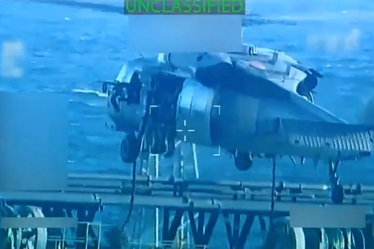 US troops raid a massive oil tanker off the coast of Venezuela in a high-risk sanctions operation