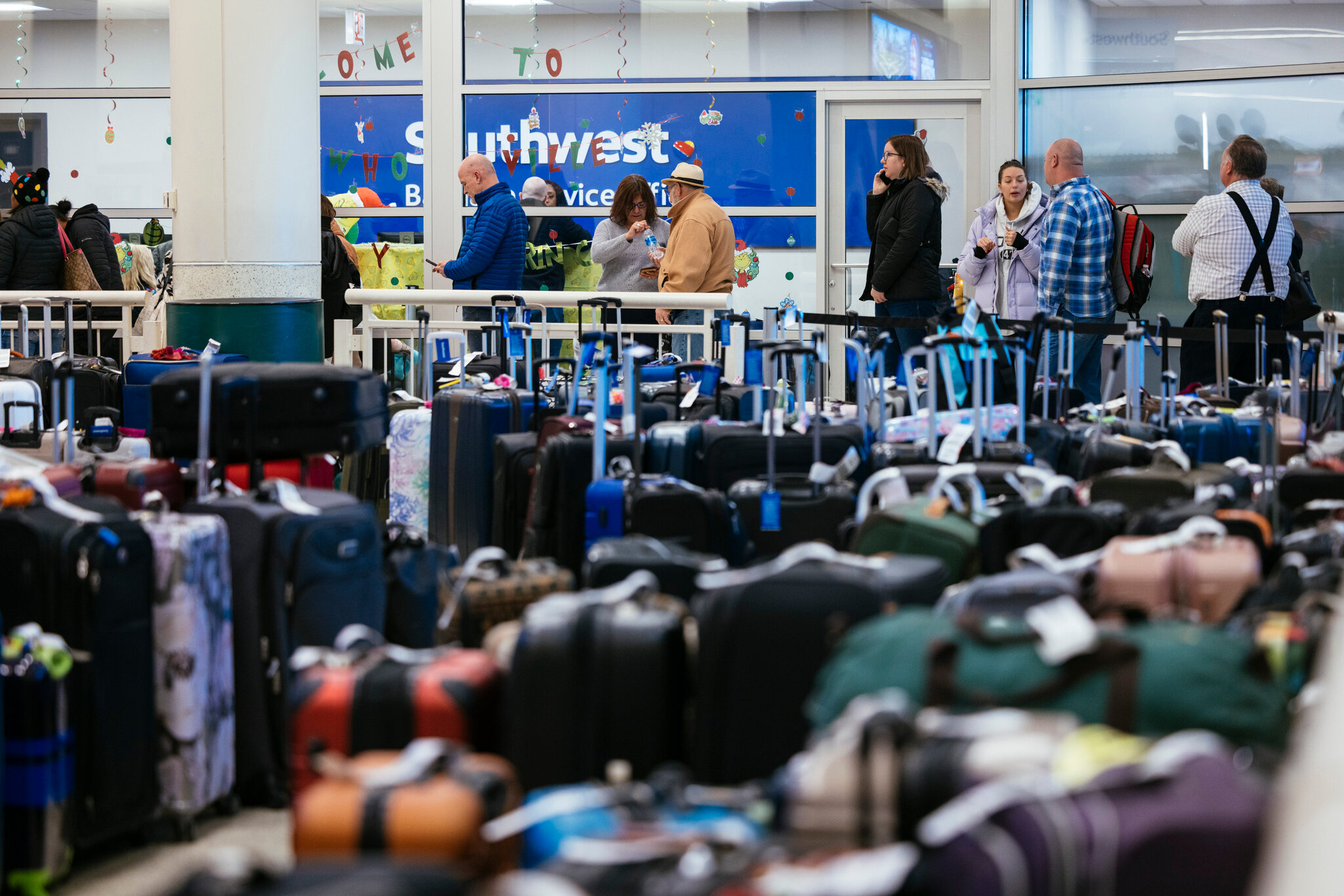 Furious Southwest passengers protest 2022 holiday cancellations stranded families