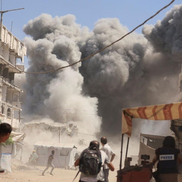 Gaza city devastated by Israeli airstrikes, highlighting civilian destruction and humanitarian crisis
