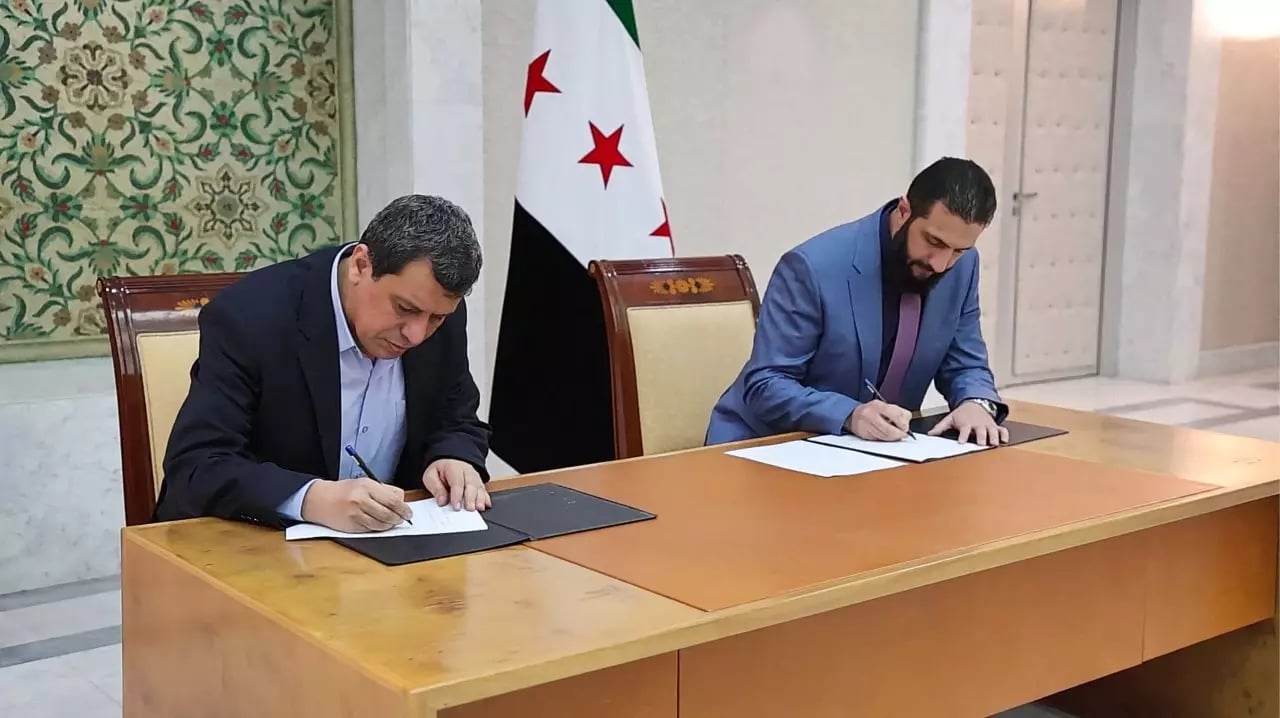 Syrian officials and Kurdish SDF representatives finalize a ceasefire agreement after weeks of fighting in northern Syria