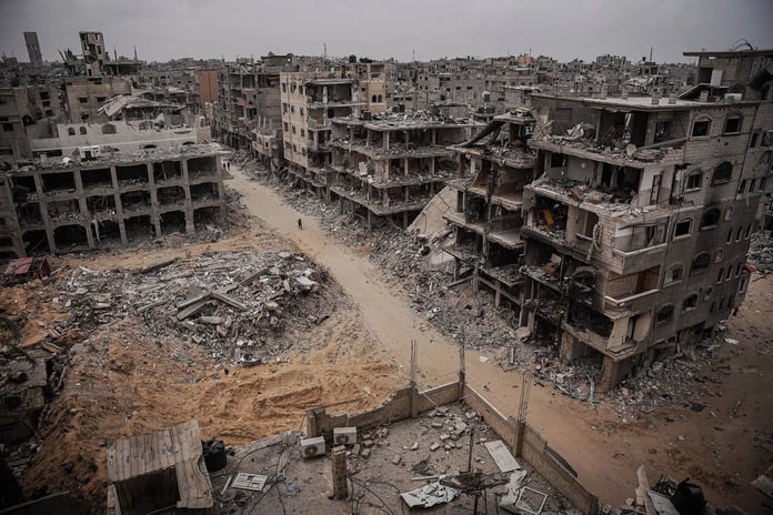 Gaza war destruction with smashed buildings and an abandoned journalist camera symbolizing targeted media deaths