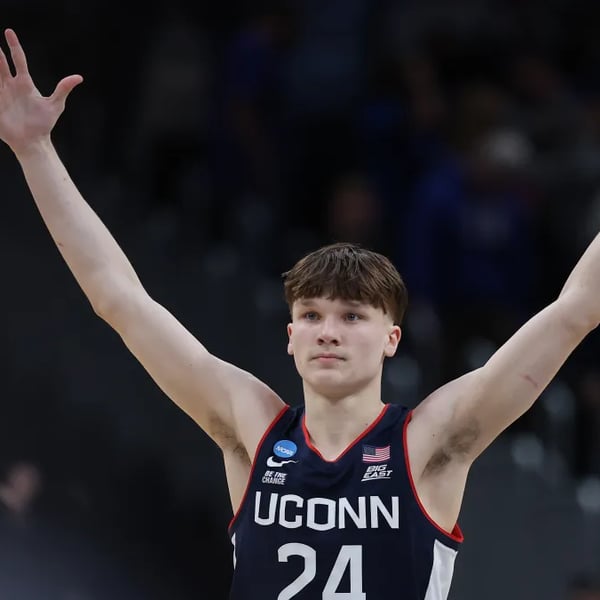 UConn freshman Braylon Mullins celebrates after his 35-foot buzzer-beater against Duke in the 2026 NCAA Tournament Elite Eight