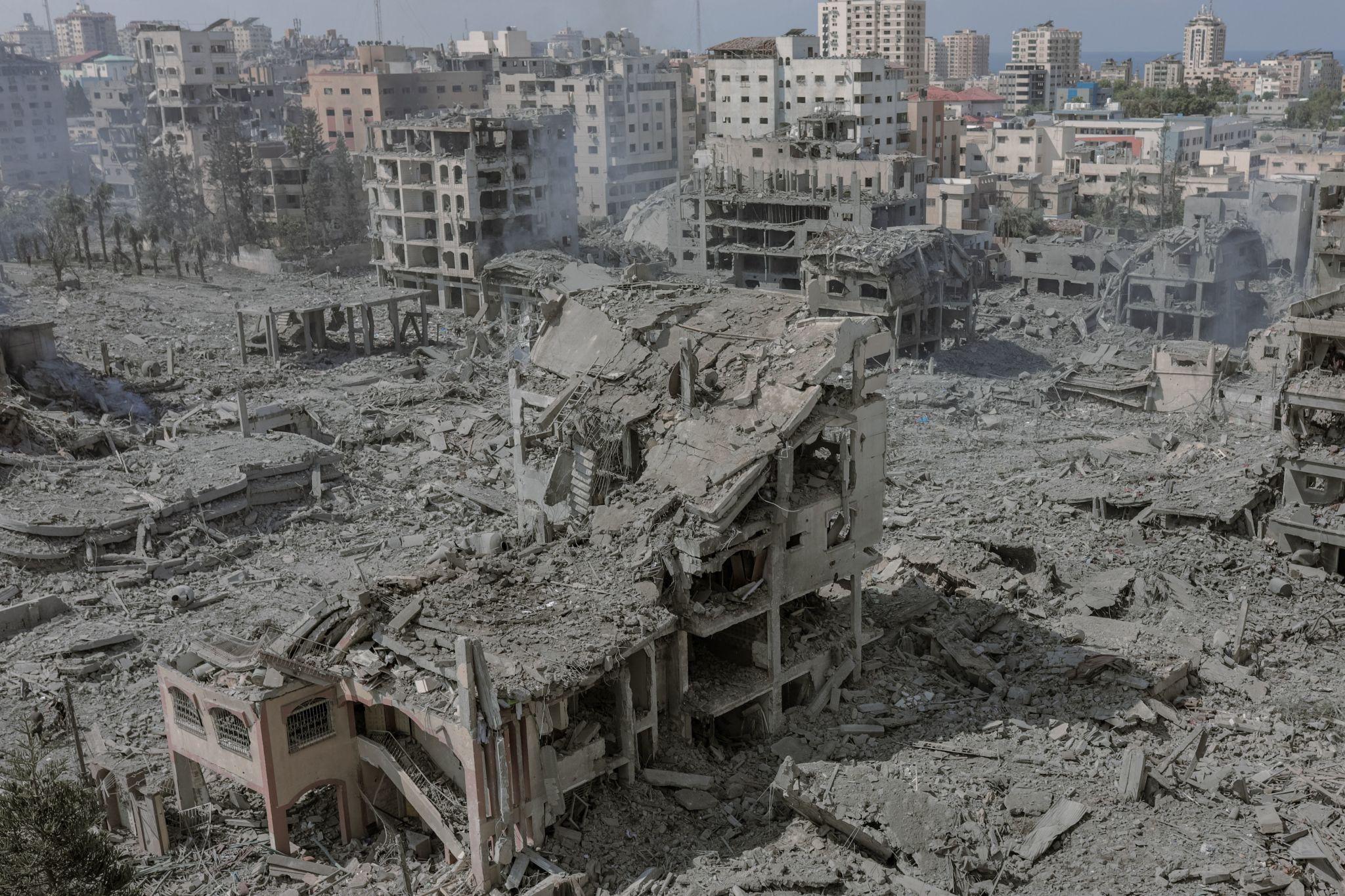 Displaced Palestinian families living among rubble in Gaza