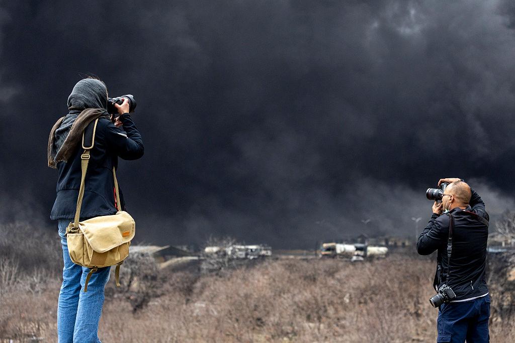 Explosions and airstrikes over Iranian infrastructure during ongoing war
