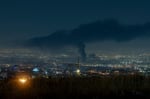 Toxic smoke rises over Tehran after Israeli airstrikes on oil facilities during Iran war