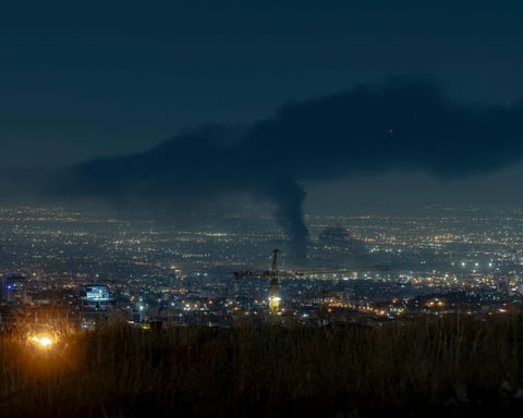 Toxic smoke rises over Tehran after Israeli airstrikes on oil facilities during Iran war