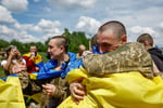 Freed Ukrainian prisoners reunite with families after Russia Ukraine POW swap