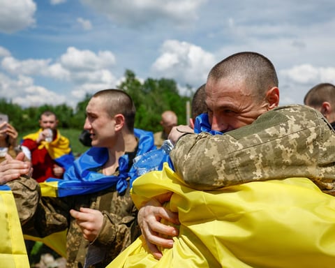 Freed Ukrainian prisoners reunite with families after Russia Ukraine POW swap