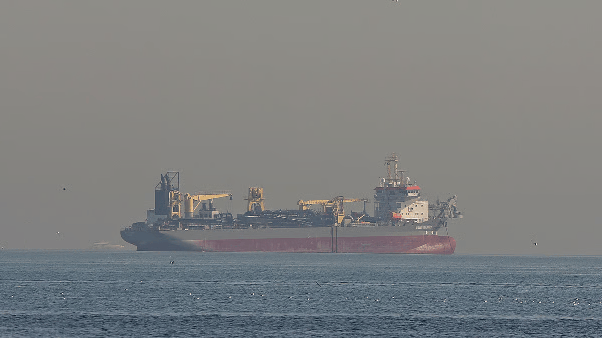 Oil tanker transits the Strait of Hormuz as oil prices surge following US and Israeli strikes on Iran