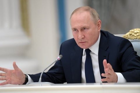 Russian President Vladimir Putin speaks during a meeting on the global energy crisis at the Kremlin in Moscow