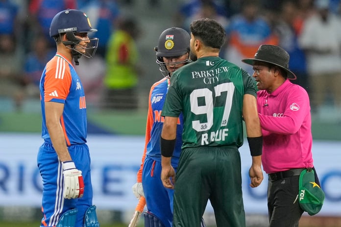 Players arguing during local cricket match in India
