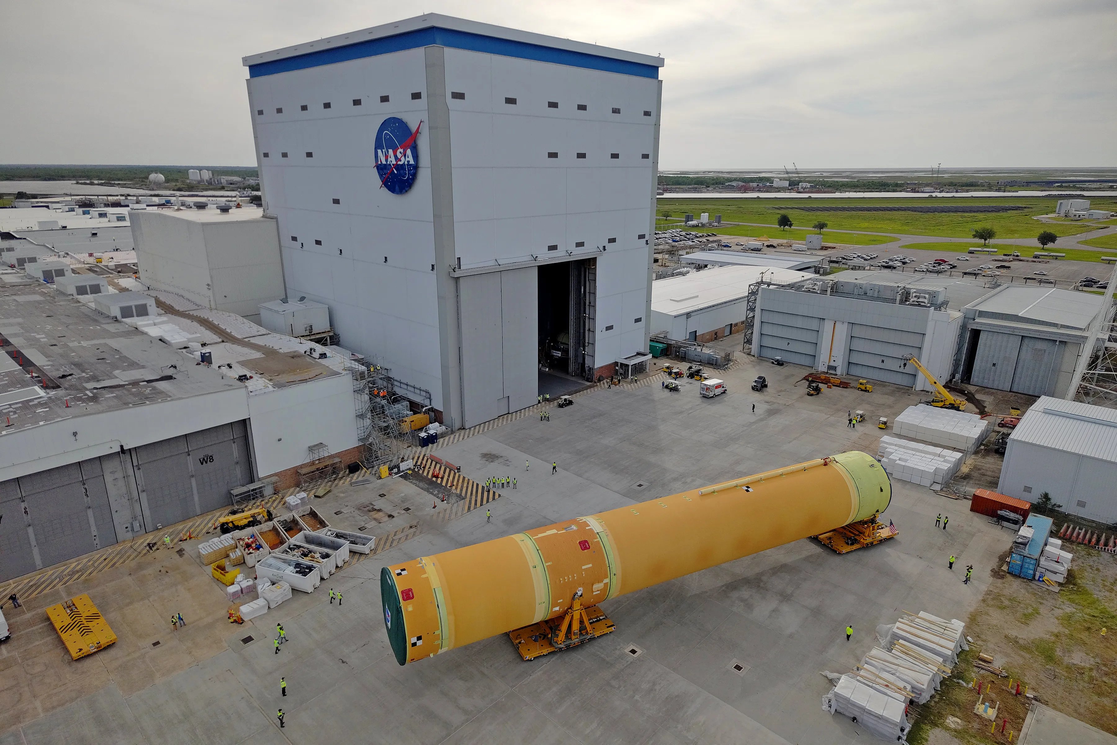 NASA Artemis III SLS core stage being transported on Pegasus barge toward Kennedy Space Center
