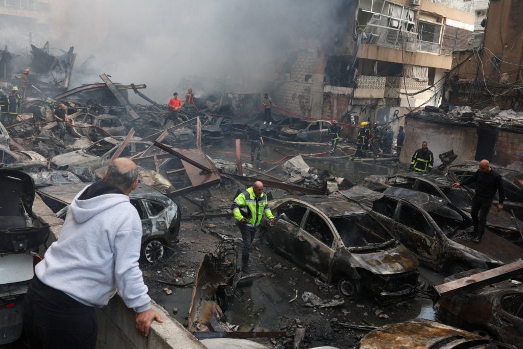Smoke rises over Beirut during Israeli airstrikes amid ceasefire confusion