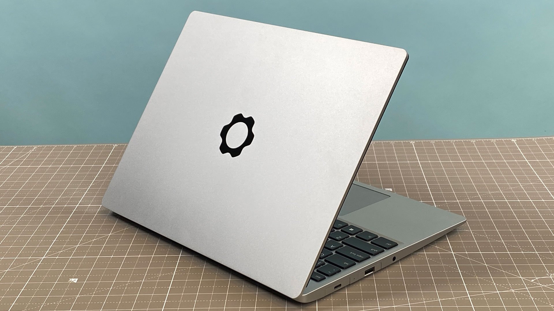 Framework Laptop 13 Pro showing modular design and premium aluminum chassis in a developer workspace