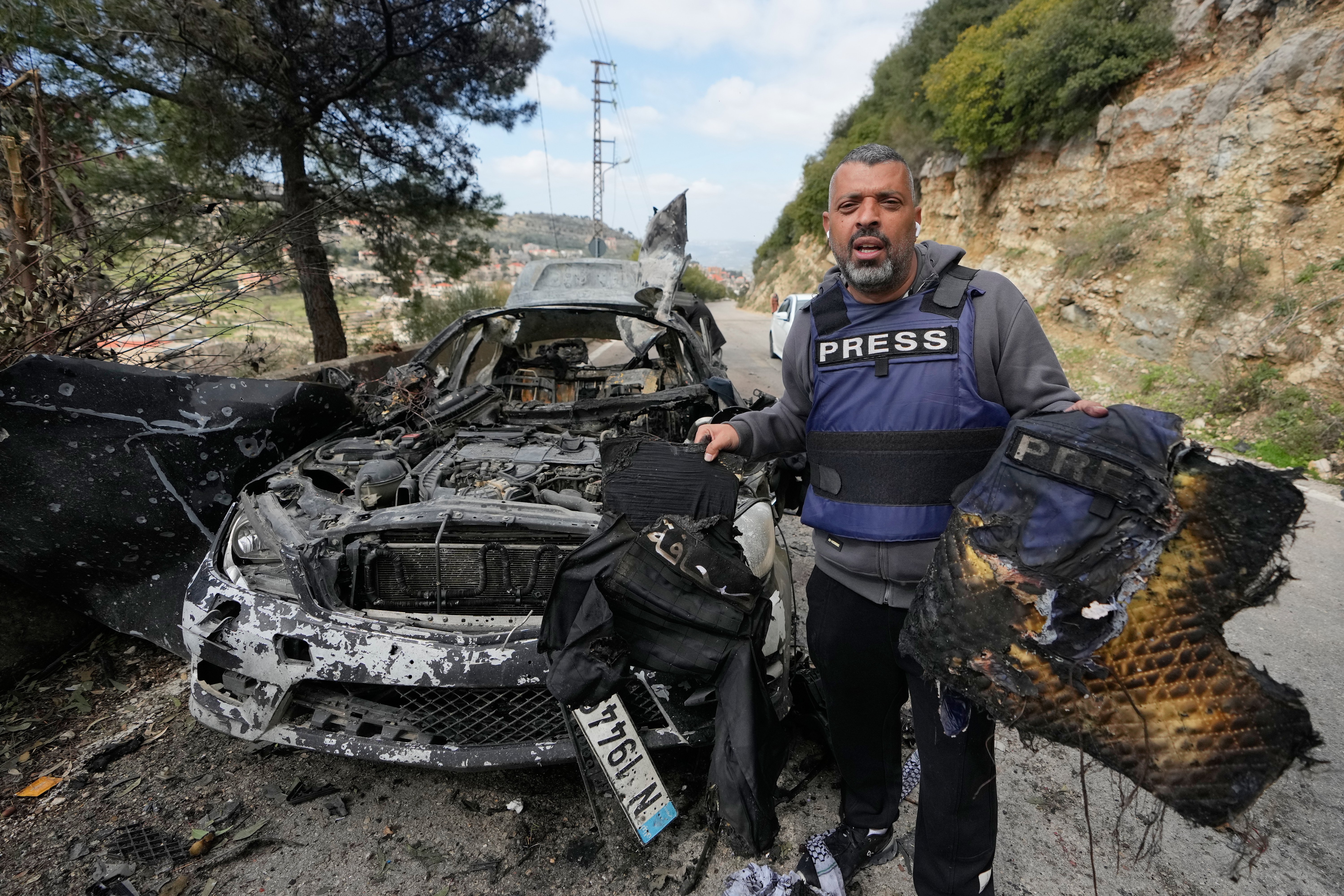 Burned vehicle after Israeli strike that killed journalist in Gaza Burned vehicle after Israeli strike that killed journalist in Gaza
