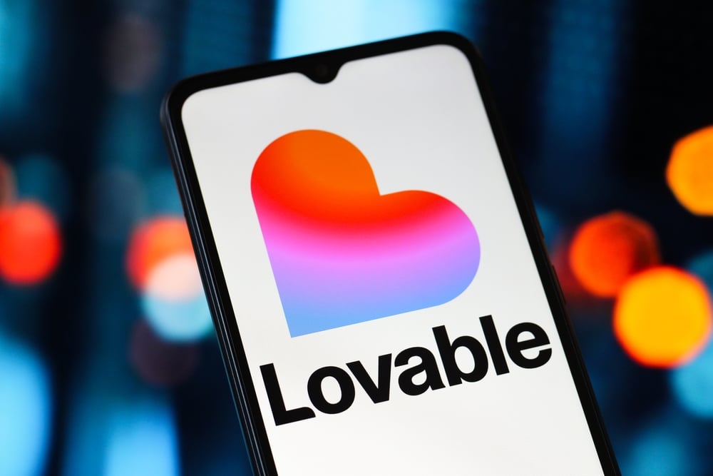 AI-powered vibe coding app interface on smartphone showing app creation using natural language prompts