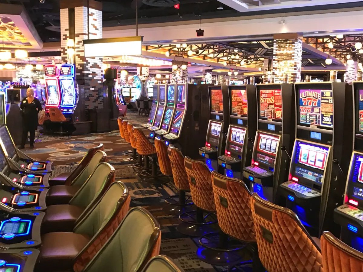 Interior of MGM Springfield casino with slot machines and players